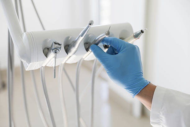 Professional Emergency Dentist technician working in Wauna, WA